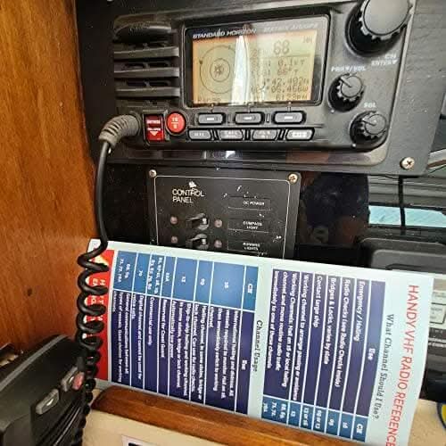 Handy VHF Reference beside radio