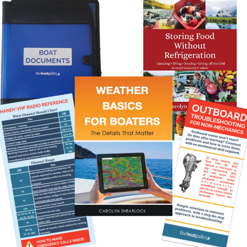Collection of books and guides related to boating and outdoor activities on a white background.