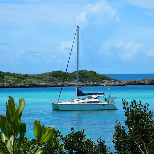 Photo of Carolyn Shearlock's catamaran, Barefoot Gal, anchored in the Bahamas.