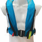 The Cruising Solutions TeamO PFD with BackTow™ - Coastal Blue UML Mark 5i is shown on a white mannequin torso, featuring black straps, a red pull tab, and yellow detailing—ideal for coastal sailing.