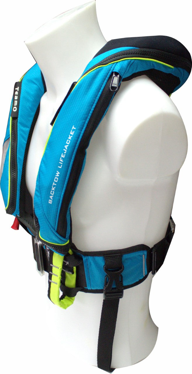 The Cruising Solutions TeamO PFD with BackTow™ - Offshore Blue Hammar, in blue and black with neon green accents, is displayed on a white mannequin torso. It features adjustable straps, buckles, and a marine safety harness for secure fit.